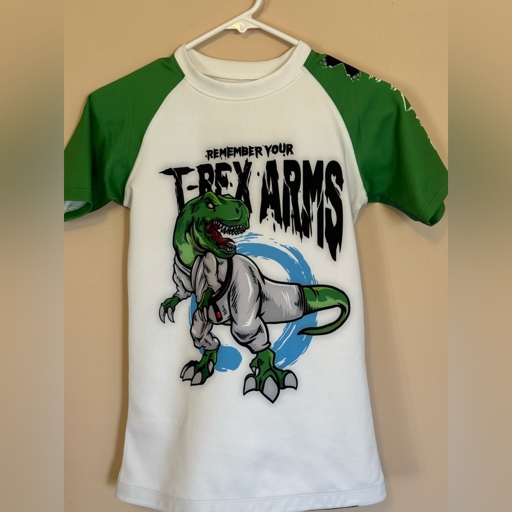 Xmartial women’s rashguard - T-Rex arms. Size medium. Excellent condition!
